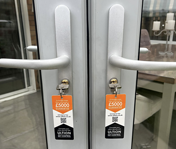 Replacement high security snap-locks fitted to uPVC patio doors